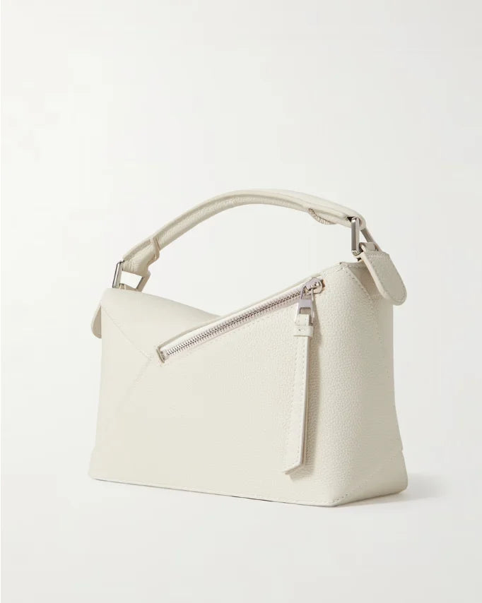Bolsa de ombro pequena Puzzle Edge em couro texturizado