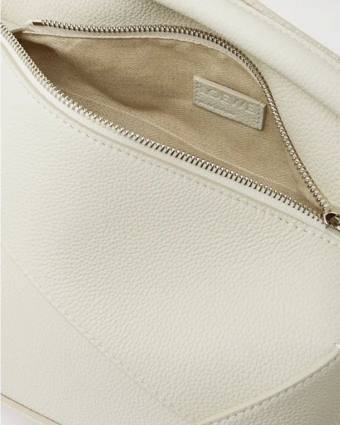 Bolsa de ombro pequena Puzzle Edge em couro texturizado