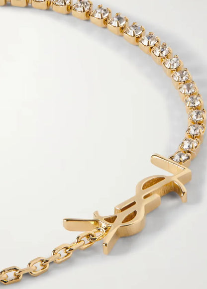 Pulseira de cristal dourado T Cassandre