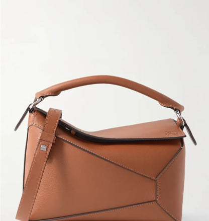 Bolsa de ombro pequena Puzzle Edge em couro texturizado