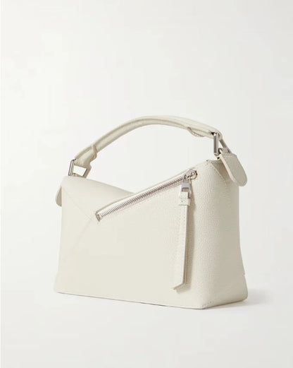 Bolsa de ombro pequena Puzzle Edge em couro texturizado