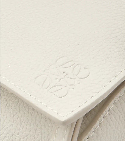Bolsa de ombro pequena Puzzle Edge em couro texturizado